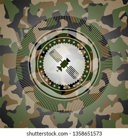 satelite icon on camouflaged texture