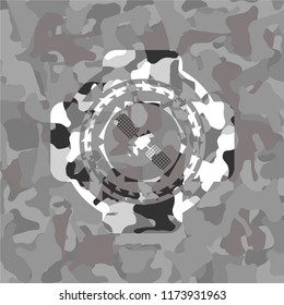 satelite icon on grey camo texture