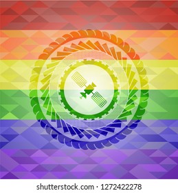 satelite icon on mosaic background with the colors of the LGBT flag