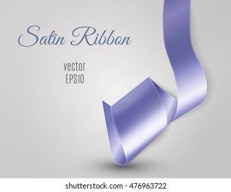 Satin ribbon curl on light grey background and free space for your text