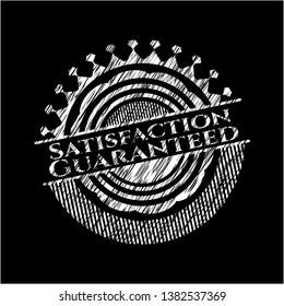 Satisfaction Guaranteed chalk emblem written on a blackboard. Vector Illustration. Detailed.