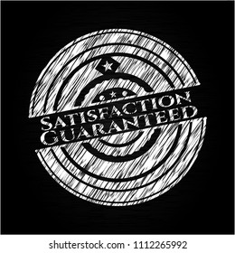 Satisfaction Guaranteed chalkboard emblem on black board