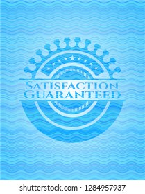 Satisfaction Guaranteed light blue water wave style badge.
