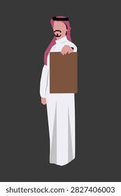 Saudi Arab man holding takeaway craft bag isolated on Dark background