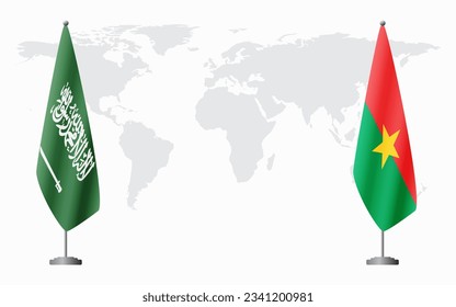 Saudi-Arabien und Burkina Faso Flaggen für offizielle Treffen vor dem Hintergrund der Weltkarte.