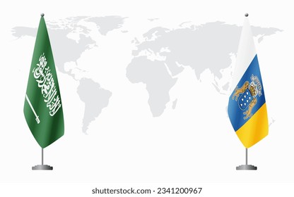 Saudi Arabia and Canary Islands flags for official meeting against background of world map.