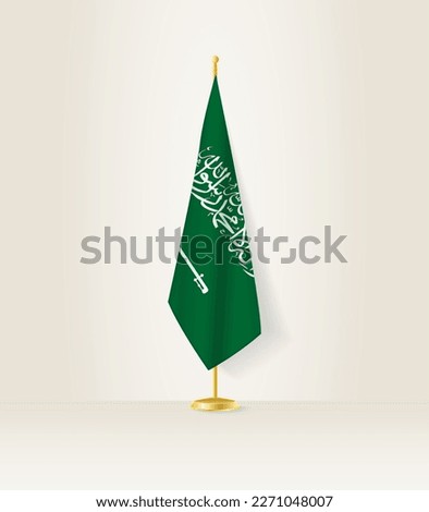 Saudi Arabia flag on a flag stand. Vector illustration.