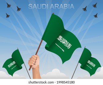 Saudi Arabia flags flying under the blue sky