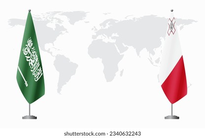 Saudi Arabia and Malta flags for official meeting against background of world map.