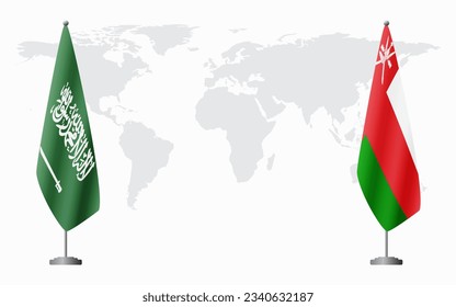 Saudi Arabia and Oman flags for official meeting against background of world map.