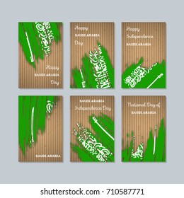 Saudi Arabia Patriotic Cards for National Day. Expressive Brush Stroke in Flag Colors on kraft paper background. Vector Greeting Card.