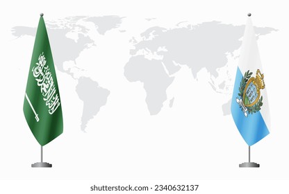 Saudi Arabia and San Marino flags for official meeting against background of world map.