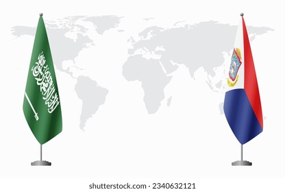 Saudi Arabia and Sint Maarten flags for official meeting against background of world map.