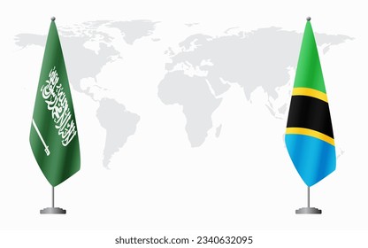 Saudi Arabia and Tanzania flags for official meeting against background of world map.