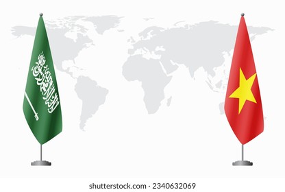 Saudi Arabia and Vietnam flags for official meeting against background of world map.