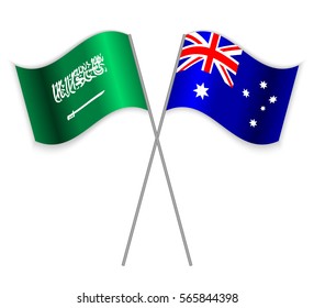 Saudi Arabian and Australian crossed flags. Saudi Arabia combined with Australia isolated on white. Language learning, international business or travel concept.