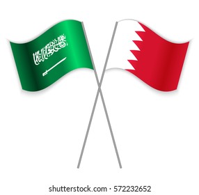 Saudi Arabian and Bahraini crossed flags. Saudi Arabia combined with Bahrain isolated on white. Language learning, international business or travel concept.