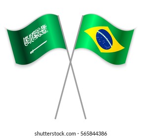 Saudi Arabian and Brazilian crossed flags. Saudi Arabia combined with Brazil isolated on white. Language learning, international business or travel concept.
