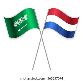 Saudi Arabian and Dutch crossed flags. Saudi Arabia combined with Netherlands isolated on white. Language learning, international business or travel concept.