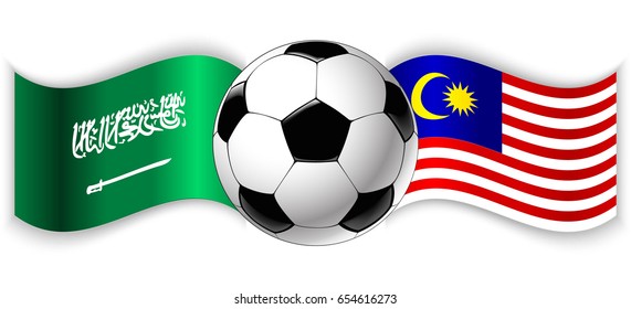 Saudi Arabian and Malaysian wavy flags with football ball. Saudi Arabia combined with Malaysia isolated on white. Football match or international sport competition concept.