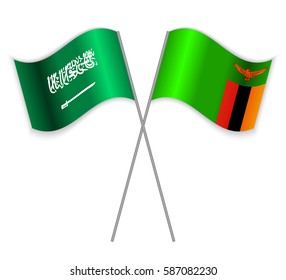 Saudi Arabian and Zambian crossed flags. Saudi Arabia combined with Zambia isolated on white. Language learning, international business or travel concept.