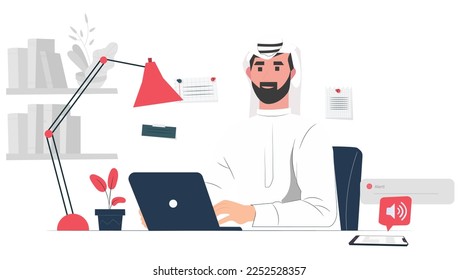 Saudi Man Working on his laptop in his office  
