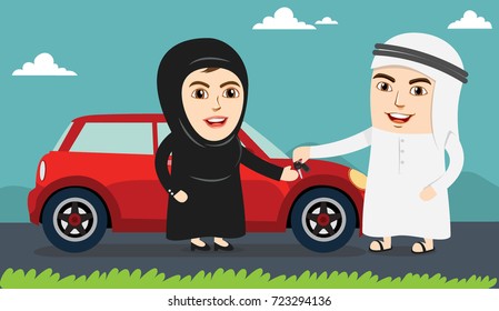 Saudi Woman Or Girl Being Happy After Getting Permission To Drive. Arab Husband Or Man Handing Over The Car Keys To His Wife. Female Drivers Are Allowed Driving License Now.