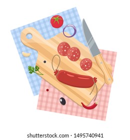 Sausage on a chopping Board, spices and a knife. The process of cooking. Home cooking.