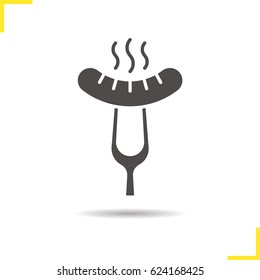 Sausage on fork glyph icon. Drop shadow silhouette symbol. Steaming bratwurst on carving fork. Negative space. Vector isolated illustration