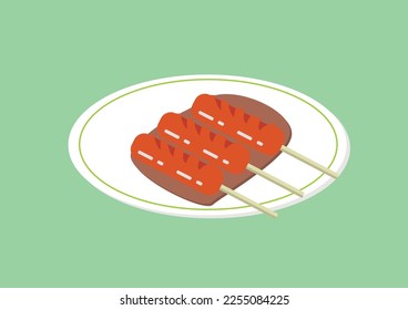 Sausage satay with sauce on a plate
