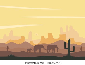 Savannah landscape. Elephants go through the desert