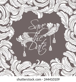 "Save The Date" card. Flourish white frame and text in the middle, decorated with feathers and tassels vintage style.