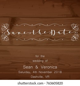 Save the date card, wedding invitation on a wooden background and letters "Save The Date"