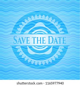 Save the Date light blue water badge background.