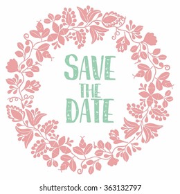 Save the date with pastel wreath