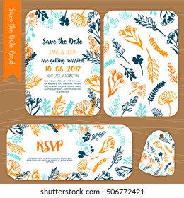 Save the date rustic vintage card, wedding invitation with hand drawn lettering, flowers and branches with RSVP card design on wooden background.