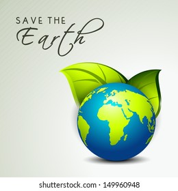 Save the earth concept with globe and green leaves. 