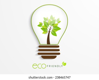Save Ecology concept with idea for save the energy, Eco Friendly text and green tree in a electric bulb on white background.