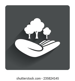 Save forest sign icon. Hand holds tree symbol. Environmental protection symbol. Gray flat square button with shadow. Modern UI website navigation. Vector