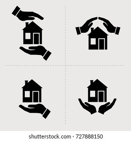 Save House icons. Houses in hands vector black icon set. Home repair and maintenance, insurance and security symbols