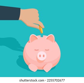 Save money - financial profit concept with hand putting coin into a piggy bank