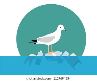 Save Ocean concept,Seagull stand on plastic bottle and trash