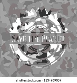 Save the Planet written on a grey camouflage texture