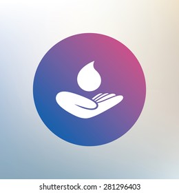 Save water sign icon. Hand holds water drop symbol. Environmental protection symbol. Icon on blurred background. Vector