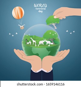 Save Wildlife concept.Wild animals in the green forest.Giraffe  in basket  tied with white rope parachute on the sky go to the green earth,paper craft modern style.