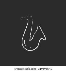 Saxophone hand drawn in chalk on a blackboard vector white icon isolated on a black background.