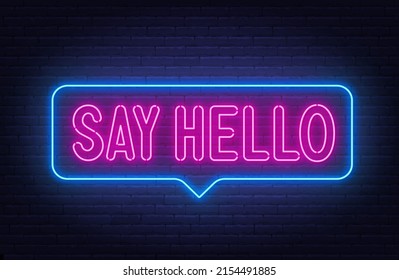Say hello neon sign in the speech bubble on brick wall background.