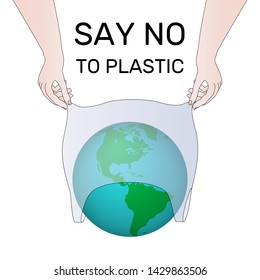 Say no to plastic - the concept of the environment. The hands of a woman remove the plastic bag from the planet Earth.