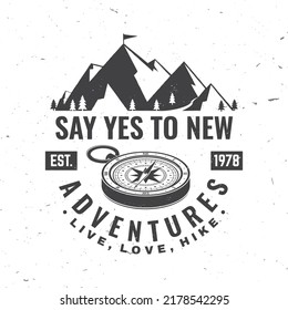 Say yes to new adventure. Live, love, hike. Vector illustration. Concept for shirt or logo, print, stamp or tee. Vintage typography design with compass and mountain silhouette. Camping quote.