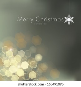 Scalable minimal shiny hexagon bokeh background with snowflake decoration for christmas cards, web site backgrounds, layouts - gold edition